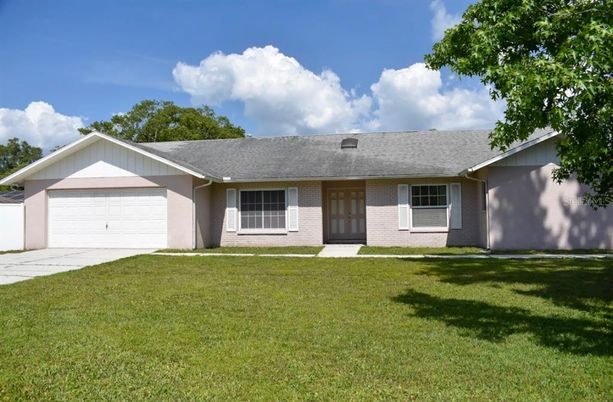 Attached, Backyard, Exterior, Facade, Brick Facade, Ranch