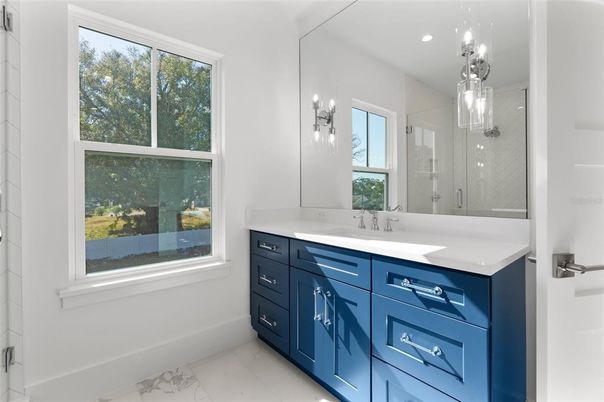 Bathroom, Dual Sink Vanities, Glass Shower, Interior, Marble, Pendant Lights, Recessed Lighting