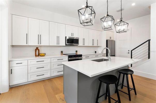 Interior, Kitchen, Pendant Lights, Recessed Lighting, Stainless Steel Appliances, Wood Texture Flooring