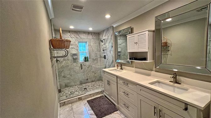 Bathroom, Dual Sink Vanities, Glass Shower, Interior, Marble, Marble Walls, Recessed Lighting