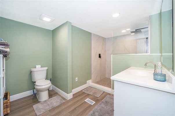 Bathroom, Interior, Marble Walls, Recessed Lighting, Wood Texture Flooring