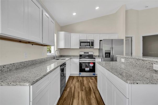 Interior, Kitchen, Recessed Lighting, Stainless Steel Appliances, Wood Texture Flooring