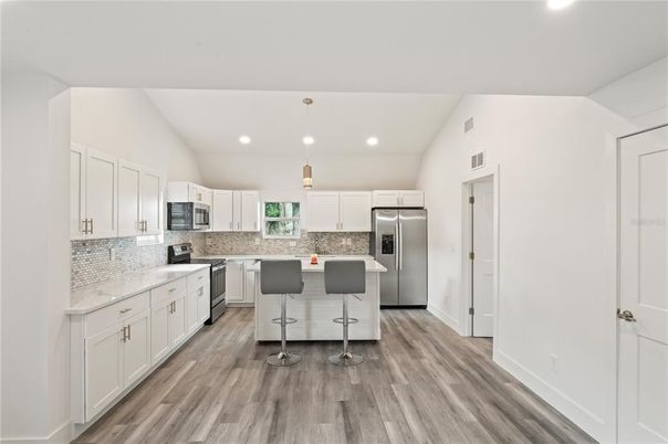 Interior, Kitchen, Pendant Lights, Recessed Lighting, Stainless Steel Appliances, Wood Texture Flooring