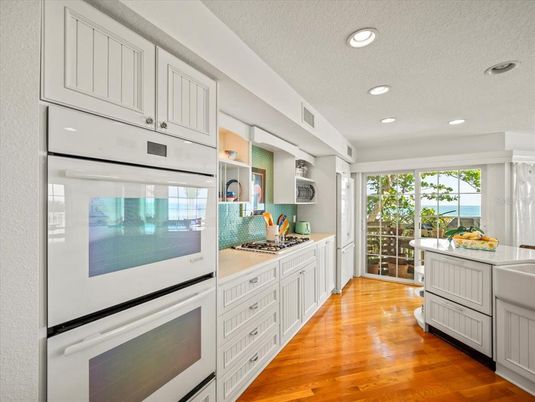 Interior, Kitchen, Recessed Lighting, Stainless Steel Appliances, Water, Wood Texture Flooring