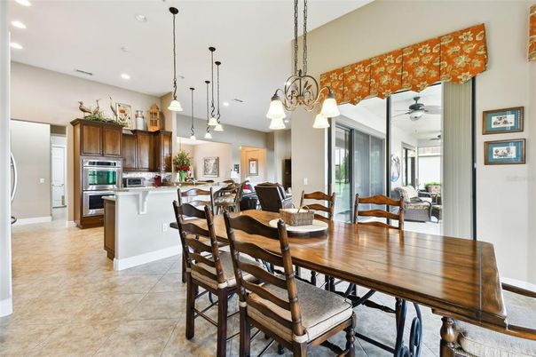 Chandelier, Dining room, Interior, Kitchen, Pendant Lights, Recessed Lighting, Stainless Steel Appliances