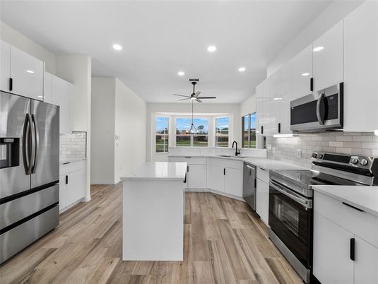 Interior, Kitchen, Recessed Lighting, Stainless Steel Appliances, Wood Texture Flooring