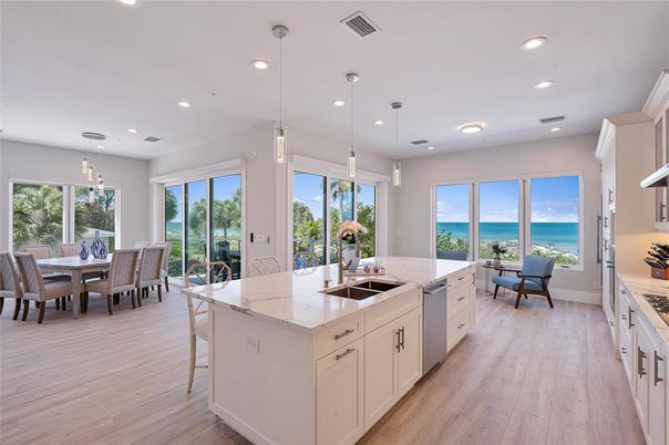 Dining room, Interior, Kitchen, Pendant Lights, Recessed Lighting, Water, Wood Texture Flooring