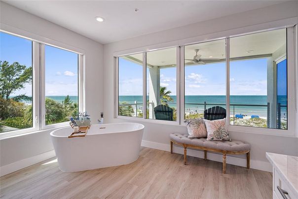 Bathroom, Free Standing Baths, Interior, Recessed Lighting, Water, Wood Texture Flooring