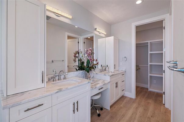Bathroom, Dual Sink Vanities, Interior, Recessed Lighting, Wood Texture Flooring