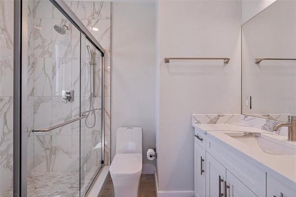 Bathroom, Dual Sink Vanities, Glass Shower, Interior, Marble Walls