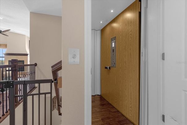 Elevator, Interior, Recessed Lighting, Wood Texture Flooring, Wooden Walls