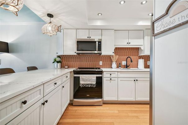 Interior, Kitchen, Pendant Lights, Recessed Lighting, Stainless Steel Appliances, Wood Texture Flooring