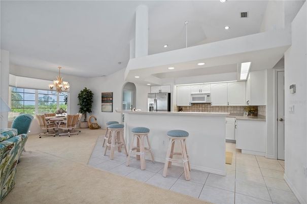 Chandelier, Dining room, Interior, Kitchen, Recessed Lighting, Stainless Steel Appliances