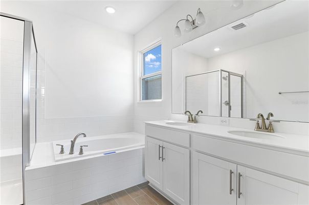 Bathroom, Dual Sink Vanities, Interior, Recessed Lighting, Wood Texture Flooring