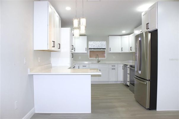 Interior, Kitchen, Pendant Lights, Recessed Lighting, Stainless Steel Appliances, Wood Texture Flooring