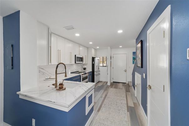 Interior, Kitchen, Recessed Lighting, Stainless Steel Appliances, Wood Texture Flooring