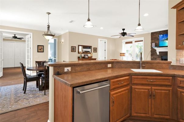 Dining room, Fireplace, Interior, Kitchen, Pendant Lights, Recessed Lighting, Wood Texture Flooring