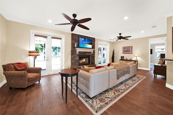 Bedroom, Fireplace, Interior, Living room, Recessed Lighting, Wood Texture Flooring