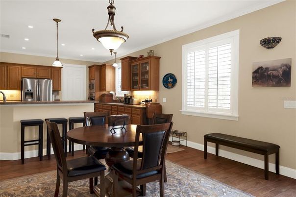 Dining room, Interior, Kitchen, Pendant Lights, Recessed Lighting, Stainless Steel Appliances, Wood Texture Flooring