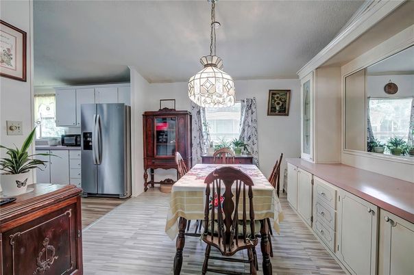 Dining room, Interior, Kitchen, Pendant Lights, Stainless Steel Appliances, Wood Texture Flooring