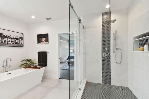 Bathroom, Free Standing Baths, Glass Shower, Interior, Marble Walls, Recessed Lighting