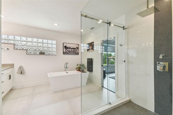 Bathroom, Free Standing Baths, Glass Shower, Interior, Marble Walls, Recessed Lighting