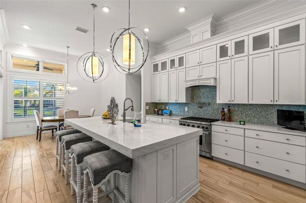 Dining room, Interior, Kitchen, Pendant Lights, Recessed Lighting, Stainless Steel Appliances, Wood Texture Flooring