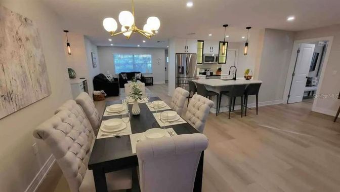 Dining room, Interior, Kitchen, Living room, Pendant Lights, Recessed Lighting, Stainless Steel Appliances, Wood Texture Flooring