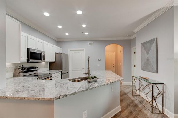 Interior, Kitchen, Recessed Lighting, Stainless Steel Appliances, Wood Texture Flooring