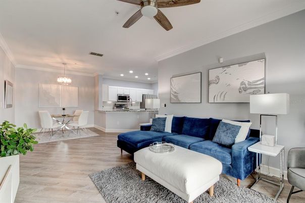 Chandelier, Dining room, Interior, Kitchen, Living room, Recessed Lighting, Stainless Steel Appliances, Wood Texture Flooring