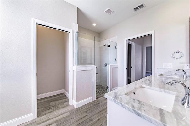Bathroom, Glass Shower, Interior, Recessed Lighting, Wood Texture Flooring