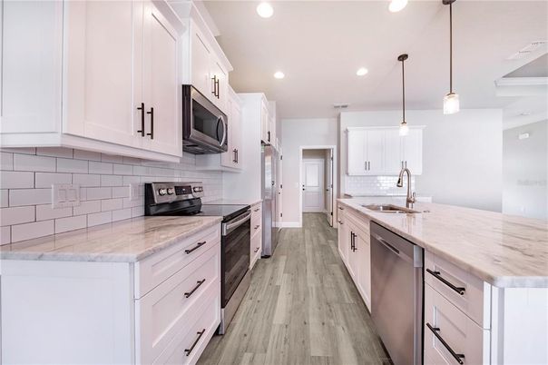 Interior, Kitchen, Pendant Lights, Recessed Lighting, Stainless Steel Appliances, Wood Texture Flooring