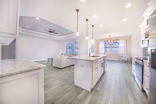 Dining room, Interior, Kitchen, Living room, Pendant Lights, Recessed Lighting, Stainless Steel Appliances, Wood Texture Flooring