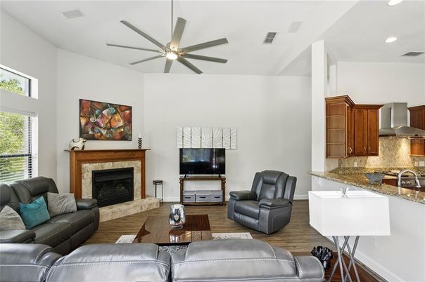 Fireplace, Interior, Kitchen, Living room, Recessed Lighting, Wood Texture Flooring