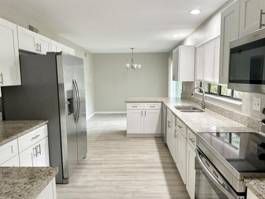Chandelier, Interior, Kitchen, Recessed Lighting, Stainless Steel Appliances, Wood Texture Flooring