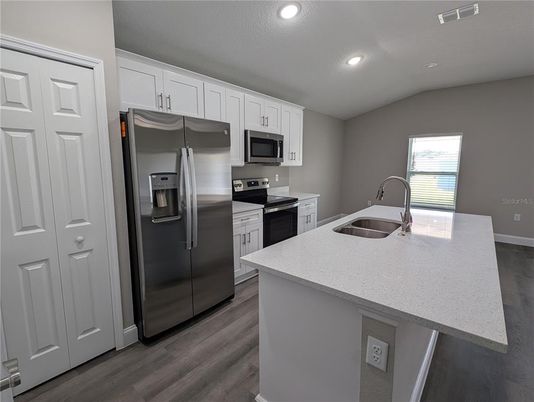 Interior, Kitchen, Recessed Lighting, Stainless Steel Appliances, Wood Texture Flooring