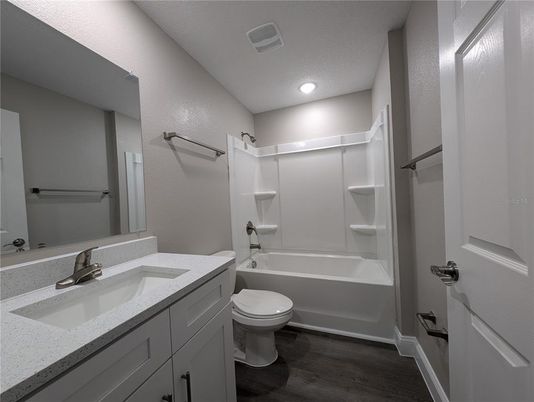 Bathroom, Dual Sink Vanities, Interior, Recessed Lighting, Wood Texture Flooring
