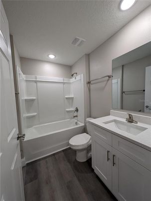 Bathroom, Dual Sink Vanities, Interior, Recessed Lighting, Walk-in Closets, Wood Texture Flooring