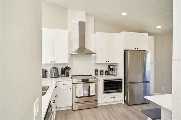 Interior, Kitchen, Recessed Lighting, Stainless Steel Appliances, Wood Texture Flooring