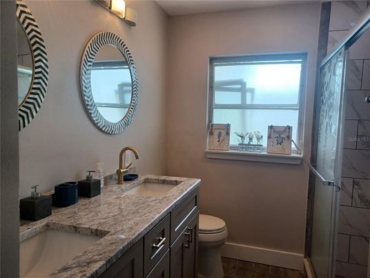 Bathroom, Dual Sink Vanities, Interior, Marble Walls, Wood Texture Flooring