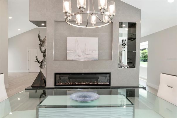 Chandelier, Fireplace, Interior, Recessed Lighting, Wood Texture Flooring