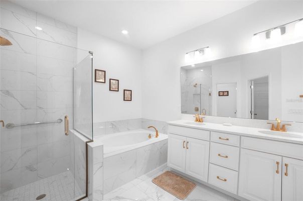 Bathroom, Dual Sink Vanities, Glass Shower, Interior, Marble, Marble Walls, Recessed Lighting