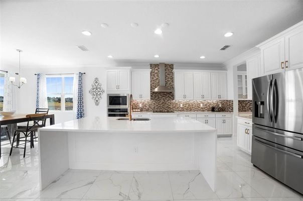 Dining room, Interior, Kitchen, Marble, Pendant Lights, Recessed Lighting, Stainless Steel Appliances
