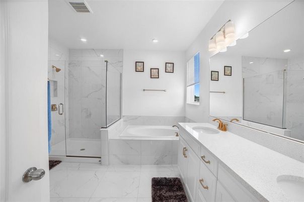 Bathroom, Dual Sink Vanities, Glass Shower, Interior, Marble, Marble Walls, Recessed Lighting