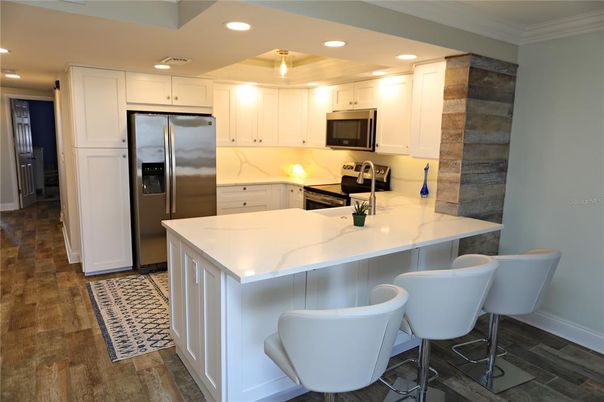 Interior, Kitchen, Recessed Lighting, Stainless Steel Appliances, Wood Texture Flooring