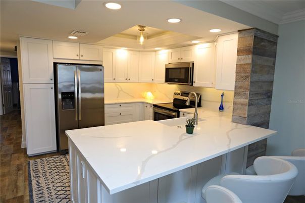 Interior, Kitchen, Recessed Lighting, Stainless Steel Appliances, Wood Texture Flooring