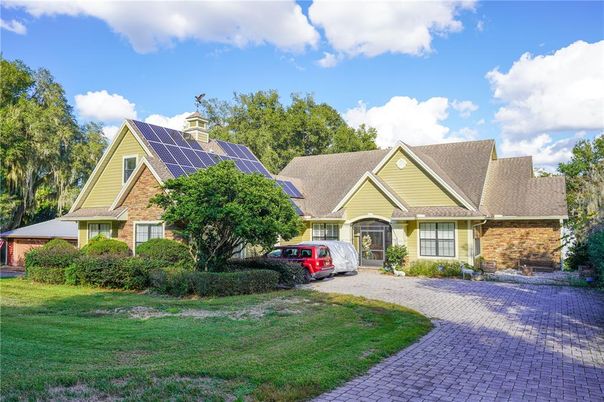Exterior, Facade, Solar Panels, Tudor Revival