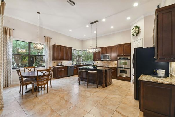 Chandelier, Dining room, Interior, Kitchen, Pendant Lights, Recessed Lighting, Stainless Steel Appliances
