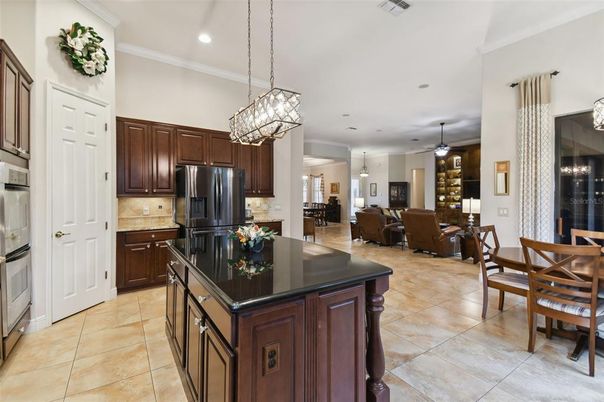 Chandelier, Dining room, Interior, Kitchen, Living room, Pendant Lights, Recessed Lighting, Stainless Steel Appliances