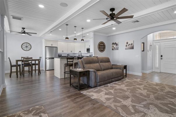 Dining room, Interior, Kitchen, Pendant Lights, Recessed Lighting, Stainless Steel Appliances, Wood Texture Flooring